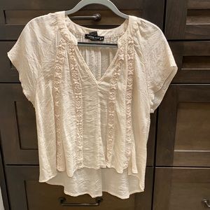 Cream colored blouse